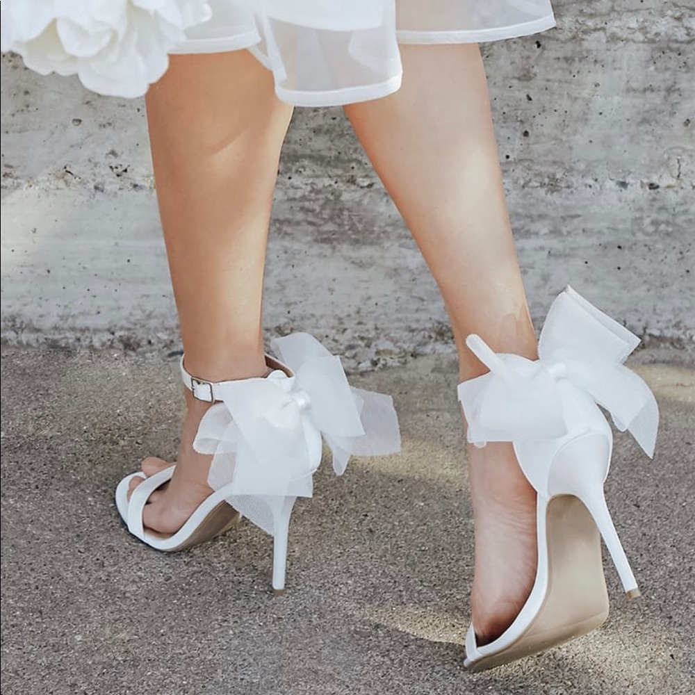 Ivory satin ankle strap bow heels